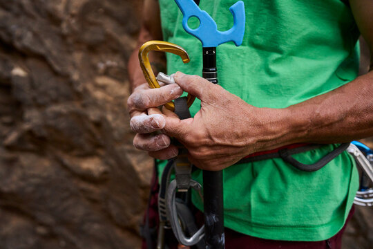 Midsection Of Senior Man With Carabiner