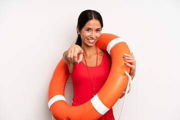 hispanic pretty woman pointing at camera choosing you. lifeguard concept