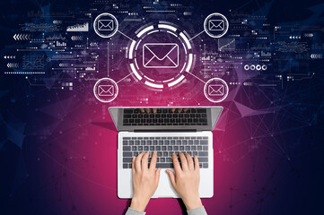 Email concept with person using laptop