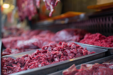 Trays with minced meat on stall