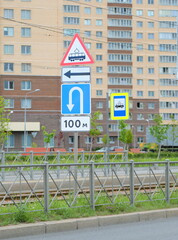 Road signs on tram tracks, Dal'nevostochny Prospekt, Saint Petersburg, Russia, July 2022