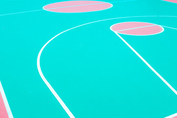 Basketball court closeup. Outdoor basketball field in bright colors.