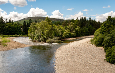 Fototapeta na wymiar View down the River Dee from the Aboyne bridge in Aberdeenshire, Scotland