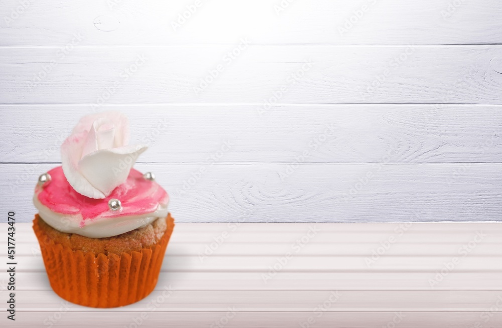 Canvas Prints Tasty butter cream cup cake muffin on the desk