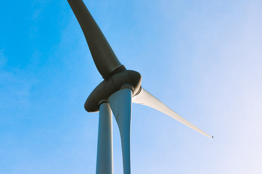 Modern windmills against blue sky
