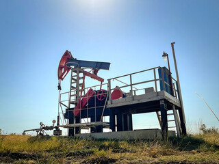 Oil producing station extracts oil from a well