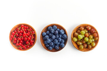 Berries mix in in a bowls on white background