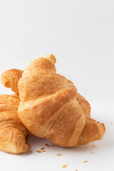 French croissant isolated on white background. Selective focus.