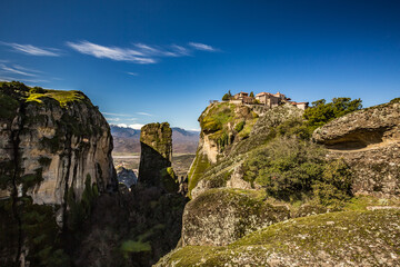 Fototapeta na wymiar Travel scenery perspective of one of Meteora monasteries built on a tall cliff. Greece