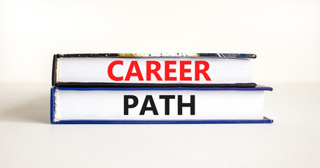 Career path symbol. Concept words Career path on books on a beautiful white table white background. Business Career path concept. Copy space.