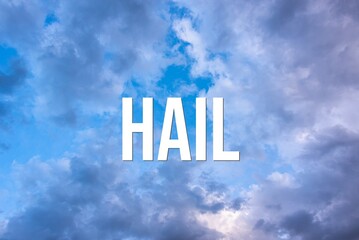 Fototapeta premium HAIL - word on the background of the sky with clouds.