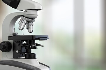 scientist prepare blood sample for research on microscope. Placing blood sample on slide. Science and medicine concept.