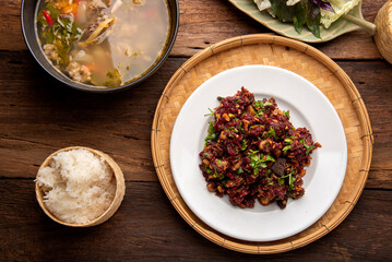 Laab Thaifood menu, raw food. laab moo mee of  the North Lanna Thai food style, on table background. thaifood concept. 