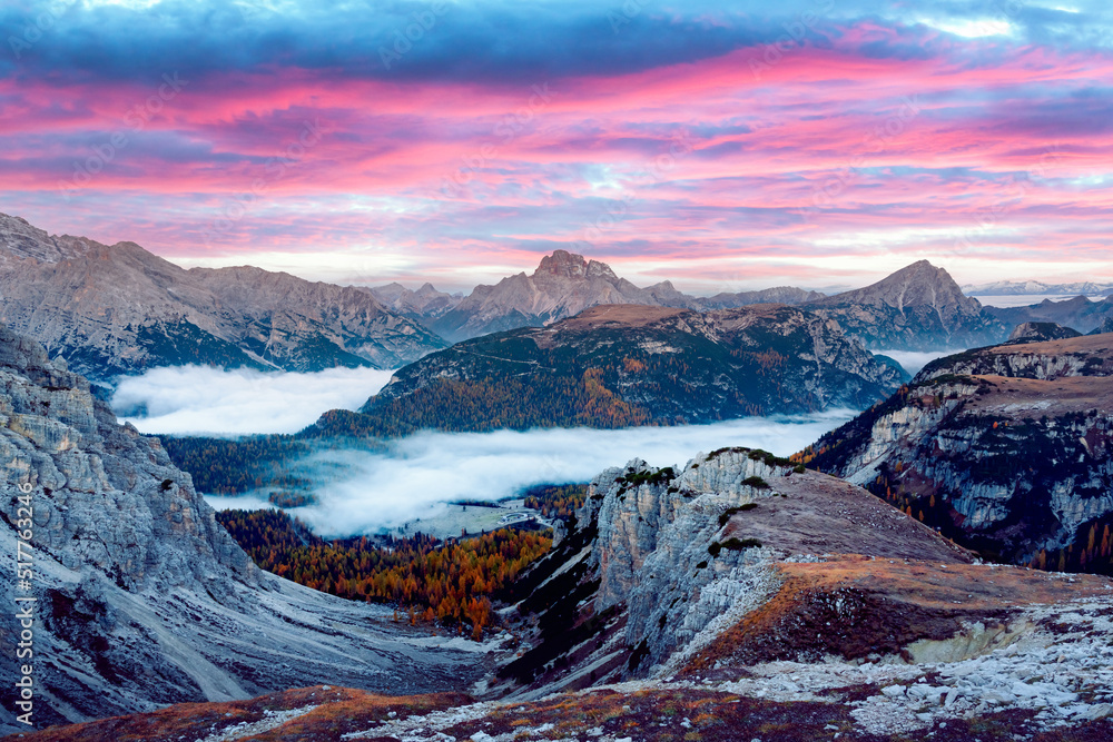Wall mural Incredible panoramical view in the foggy morning Dolomites mountains. Location Auronzo rifugio in Tre Cime di Lavaredo National Park, Dolomites, Trentino Alto Adige, Italy - Wall murals