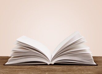 An open empty old notebook on the desk background.
