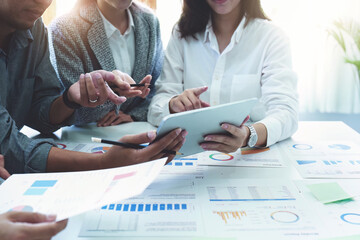 Planning to reduce investment risks, the image of a group of businesspeople working with partners...