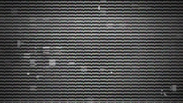 Animation of screen with glitch and flickering pattern on black background