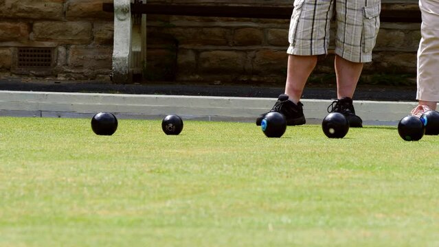 Game of lawn bowling sports activity medium shot