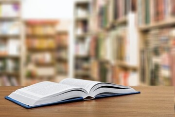 An open empty old notebook on the desk background.