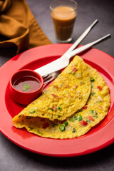 Indian Spiced Masala Omelet filled with fresh vegetable, healthy meal