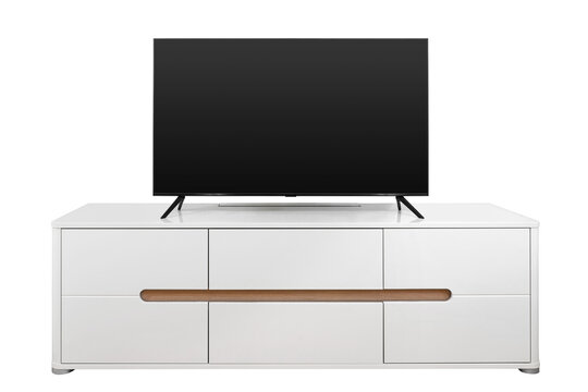 Flat screen TV on a white nightstand isolated on a white background