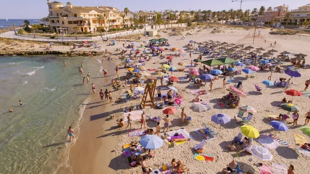 Aerial view of La Zenia, Orihuela during sunny summer day. Costa Blanca. Spain. Travel and tourism concept. Cinematic 4K