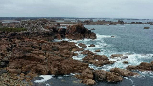 Bretagne - Aerial view of the Brittany's shore with waves crashing on rocks