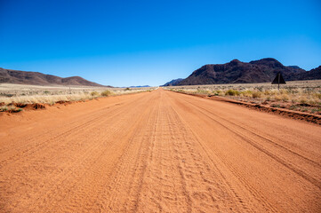 Fototapeta na wymiar Road in Kalahari Desert, Namibia