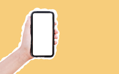 Fototapeta na wymiar Smartphone with mockup in male hand, isolated with white contour on yellow.