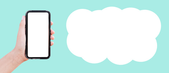 Smartphone in hand on blue background, copy space, panoramic banner, empty blank speech bubble.