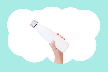 Female hand holding metal water bottle in white blank speech bubble on green background.
