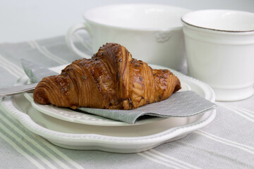 Close up French Pastry, black Sesama topped on Croissant