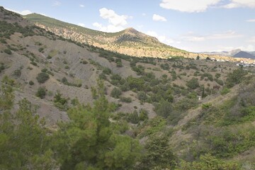 Naklejka premium Panoramic beautiful mountain landscape, summer sunny day, the city of Sudak, Crimea, the Black Sea, Russia.