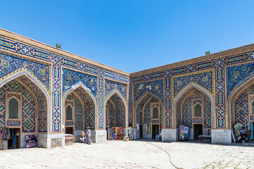 SAMARQAND, UZBEKISTAN - JUNE 09, 2022: Inside of Tillya-Kari madrasah decorated with mosaics on...