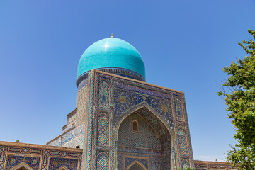Inside of Tillya-Kari madrasah decorated with mosaics on Registan Square in Samarkand, Uzbekistan.