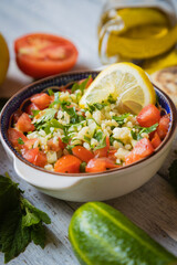 Lebanese tabbouleh salad with bulgur, parsley, tomato and cucmber