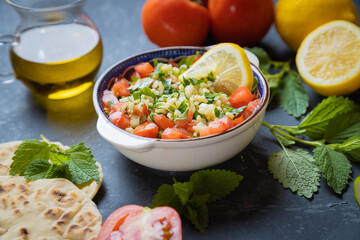 Lebanese tabbouleh salad with bulgur, parsley, tomato and cucmber