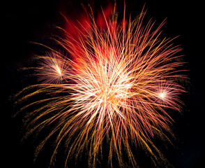 Obraz premium Beautiful bright fireworks lighting up night sky