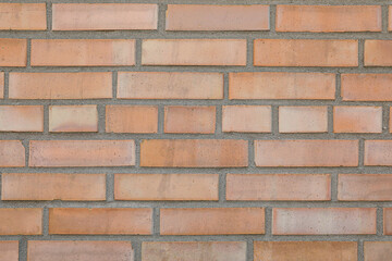 Texture of beige brick wall as background