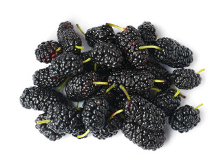 Pile of ripe black mulberries on white background, top view