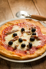 pizza margherita with  anchovies and black olives