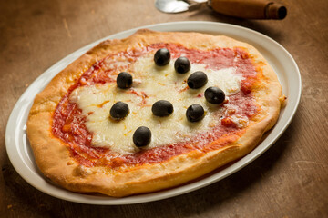 pizza margherita with black olives