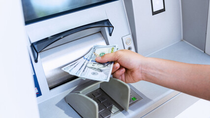 Atm machine screen. Holding american bill cash. Woman withdraw money usd hundred dollar. Money...