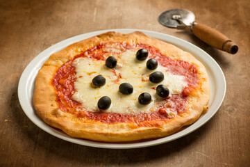 pizza margherita with black olives