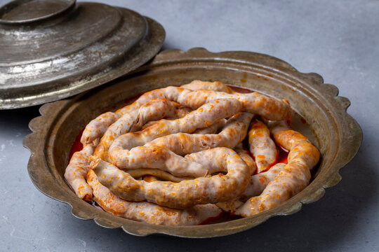 Traditional delicious Turkish cuisine, Middle Eastern dishes, offal dishes, stuffed sheep intestines (Turkish name; Mumbar dolmasi)