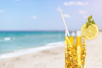 Delicious refreshing summer drink, iced in a glass. Ice tea, lemonade