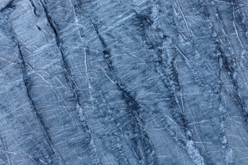 Naklejka premium Patterns design of ice on a mountain glacier