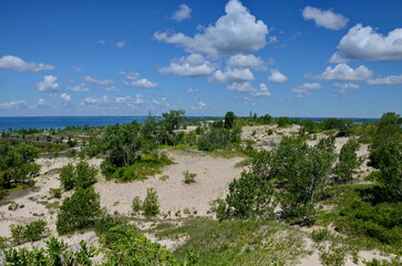 Dunes Beach sand dunes at Sandbanks Provincial Park in Ontario, Canada.   Sandbanks is the largest baymouth barrier dune formation in the world. It is located on Lake Ontario.