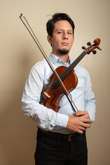 Portrait of a musician with a violin