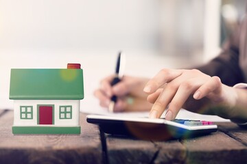 Fototapeta premium Business person taking real estate quotes